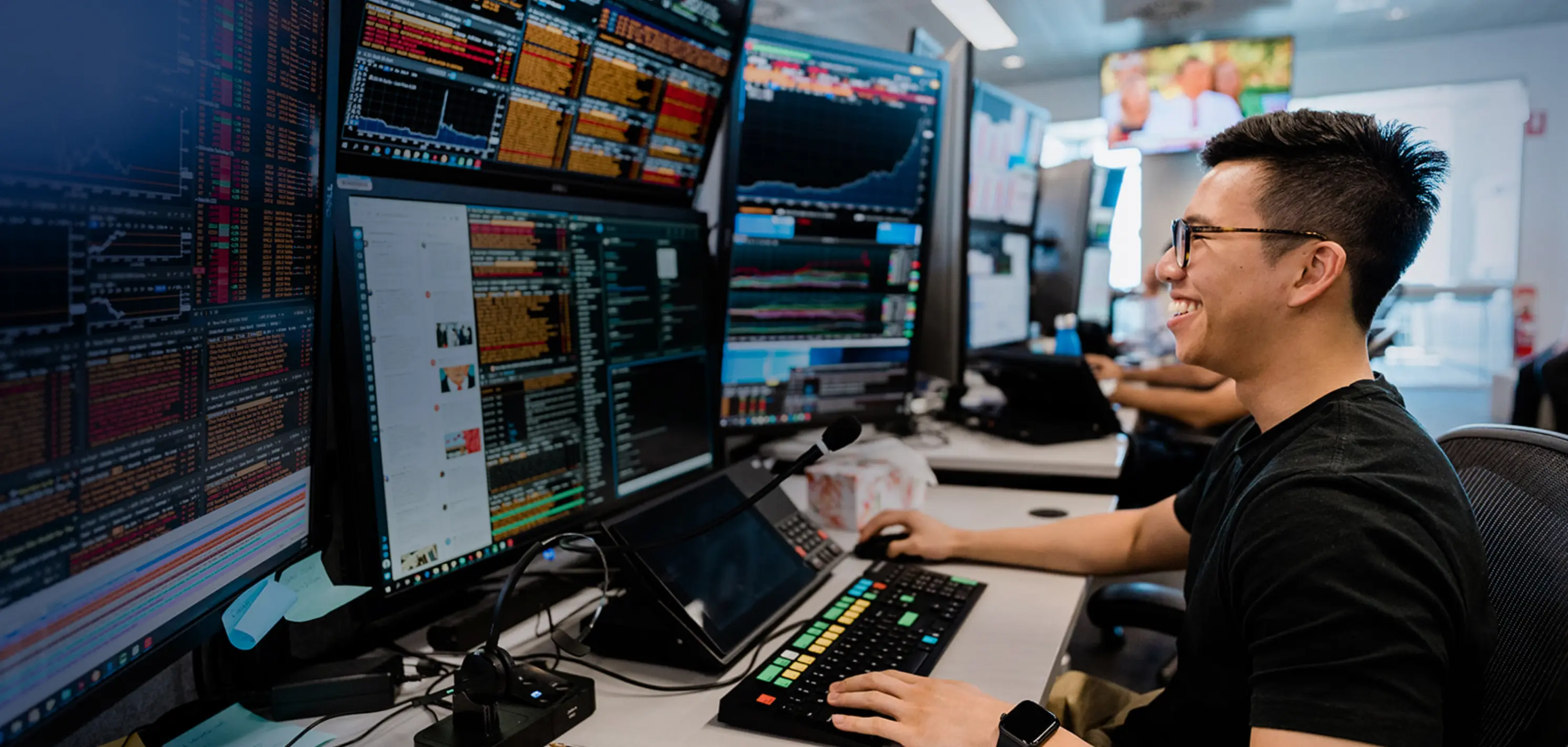 A person working at a trading desk