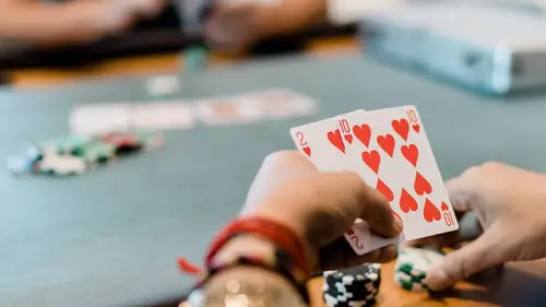 Someone holding a poker hand