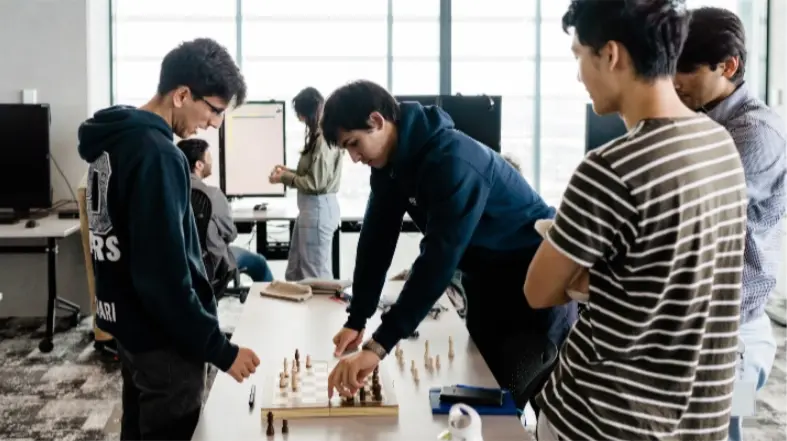 Employees playing chess