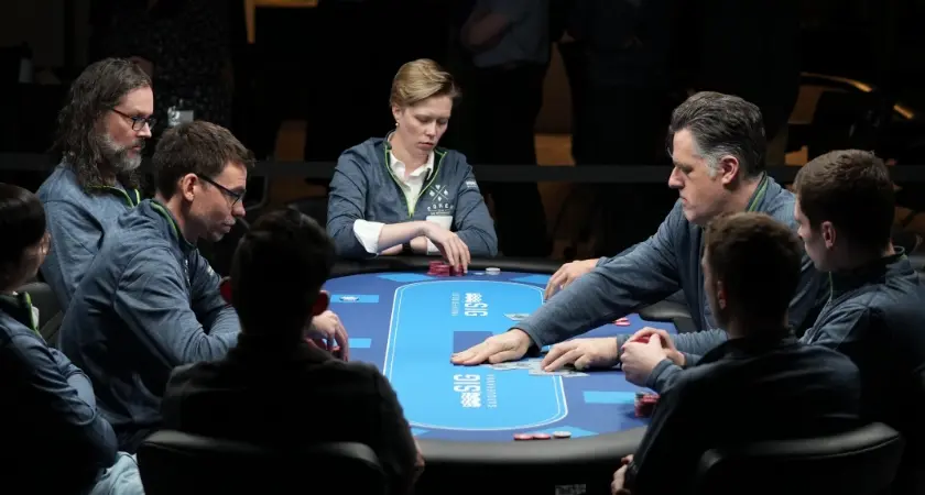 employees playing poker 